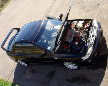 My 2.5 RS With the hood open, showcasing the STI engine swap.