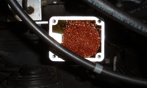 Greddy catch can filled with copper mesh.