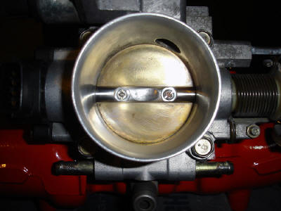 Knife edged, ported and polished throttle body.