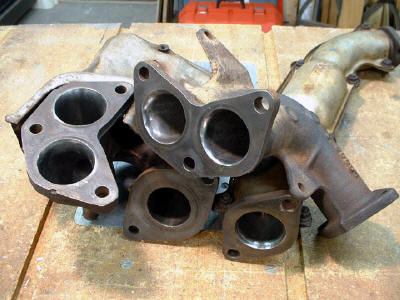 Ported and polished headers