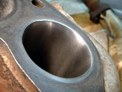 Ported and polished exhaust header inlet.