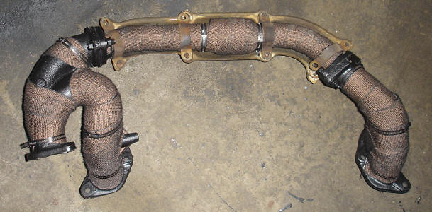 Painted and wrapped headers being re-assembled.