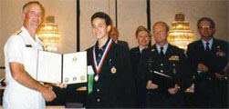 Me receiving an award at an international science fair.