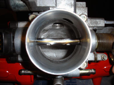 Knife edged, ported and polished throttle body.