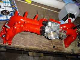 Port and polished, powder coated intake manifold and throttle body.