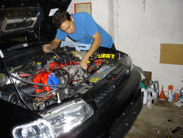 Re-assembling the engine manifold.
